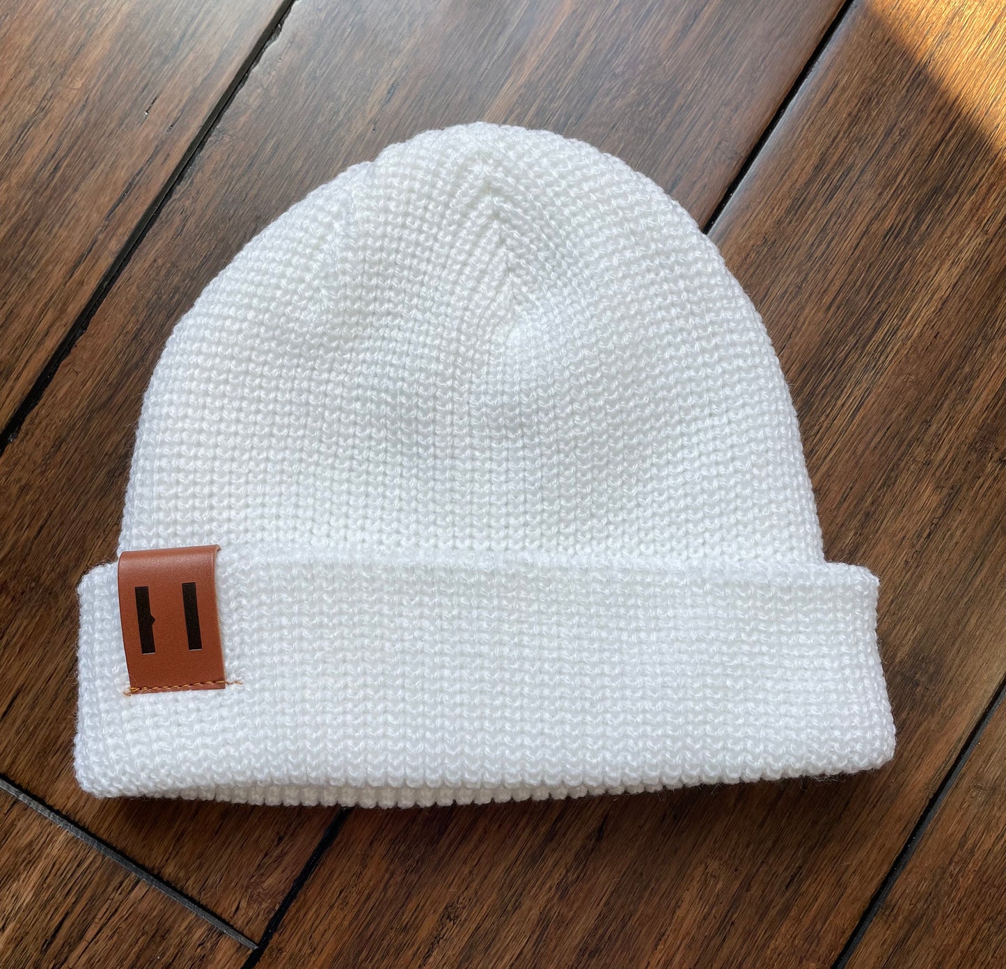 Knit leather tag beanie