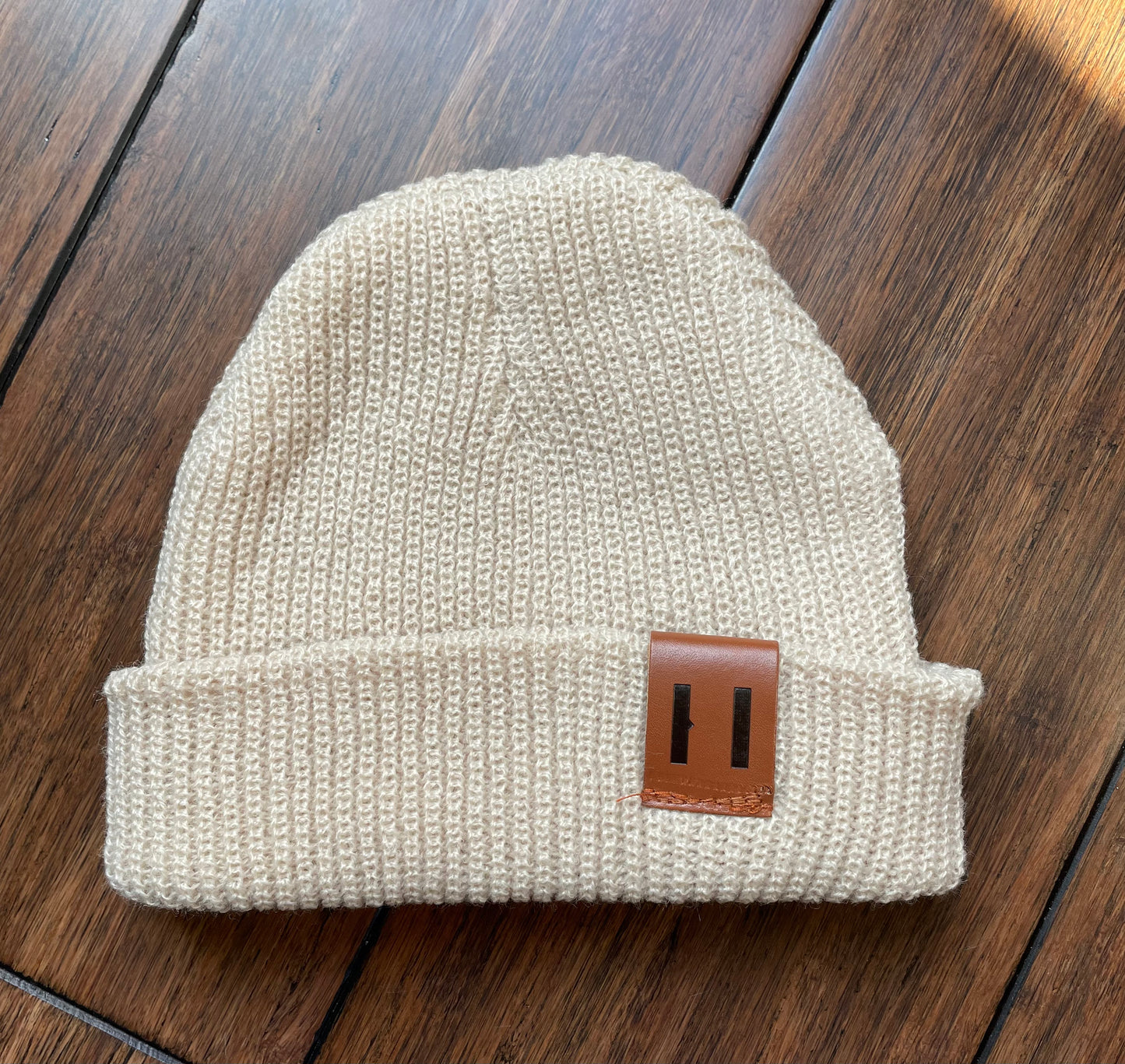 Knit leather tag beanie